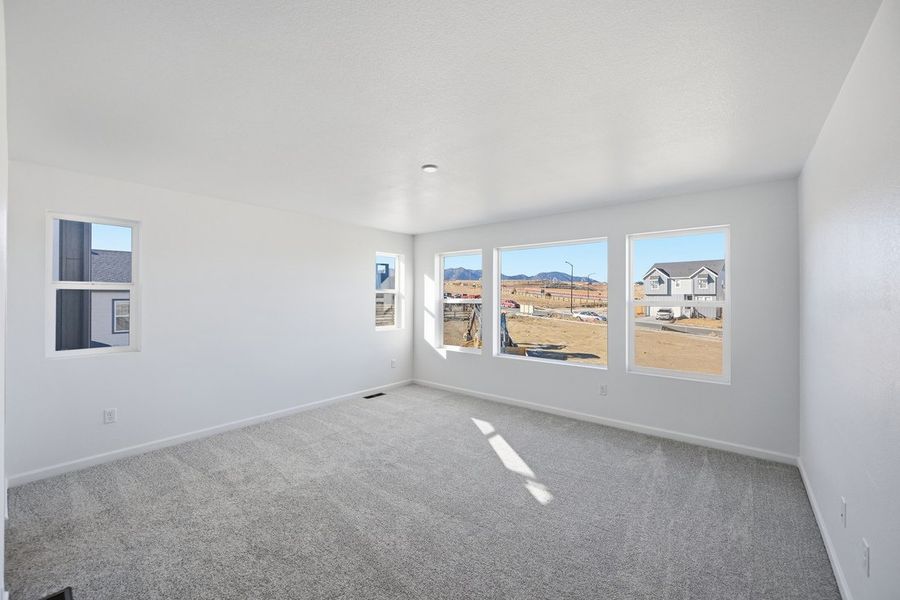 Spacious, unfurnished interior of a new home in Trailstone, Arvada (Image 23).