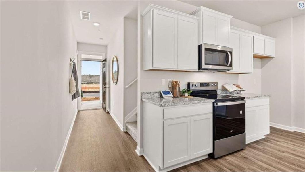 Furnished interior view inside a new home in Echo Glen, Stockbridge (Image 6).