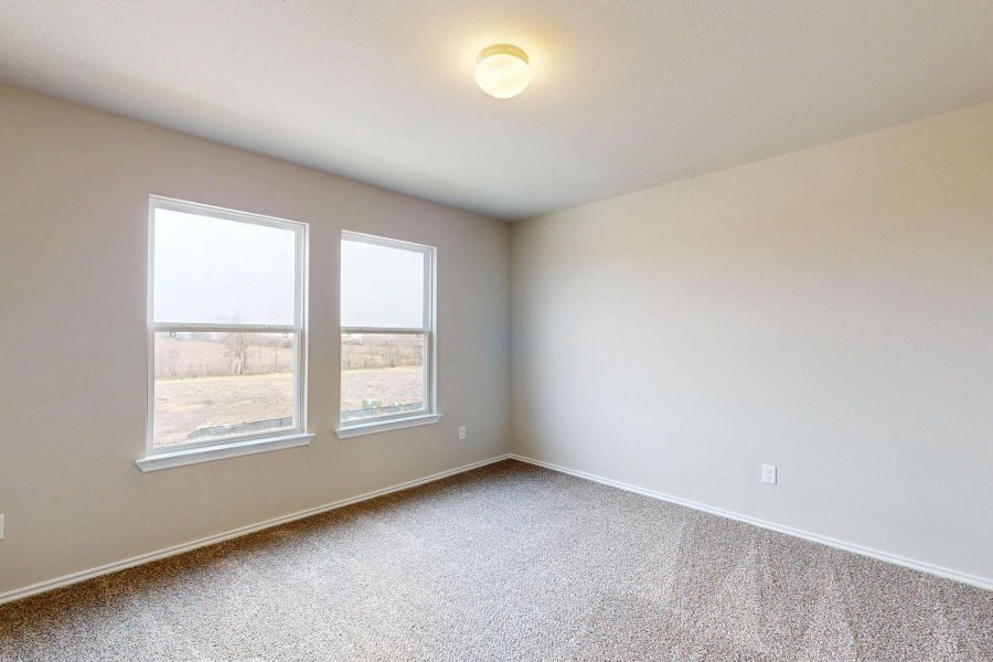 Spacious, unfurnished interior of a new home in Carillon, Manor (Image 40).