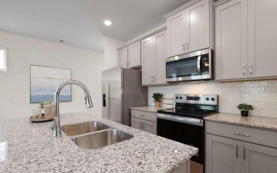 Furnished interior view inside a new home in Walden Park - The Retreat, Jonesboro (Image 6). Furnished interior view inside a new home in Walden Park - The Retreat, Jonesboro (Image 6).