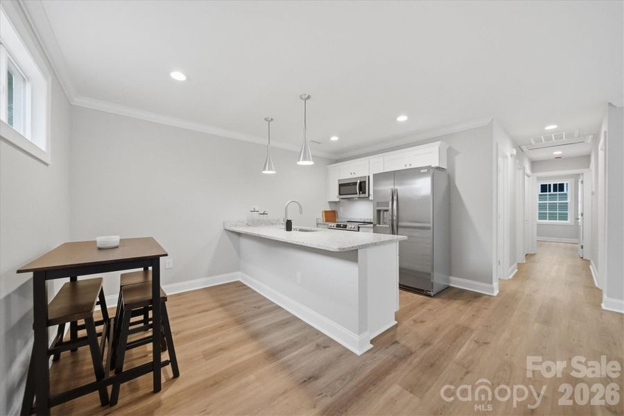 Furnished interior view inside a new home in , Hickory (Image 4).