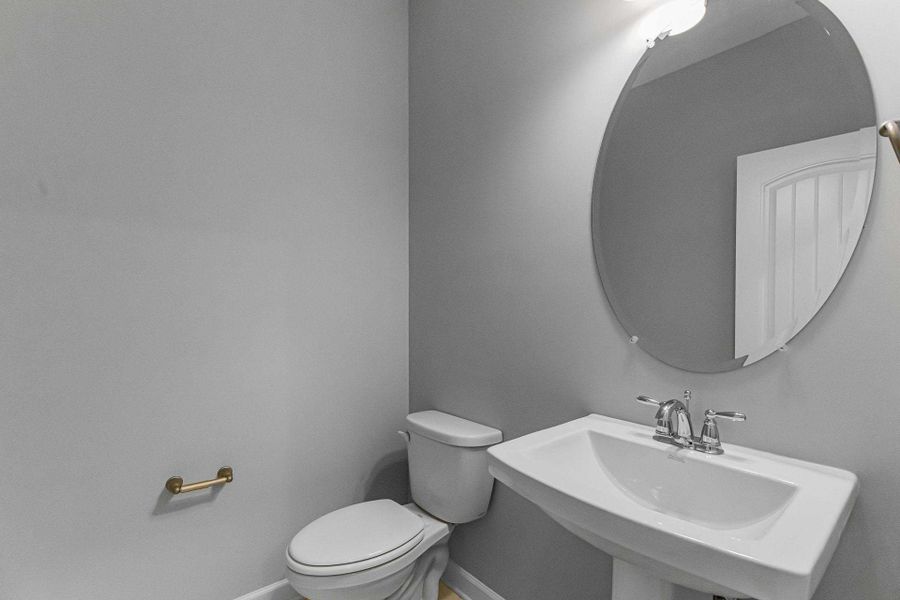 Representative furnished interior of a home built from the Drayton by Caviness & Cates Communities in Bartlett Manor, Youngsville (Image 194).