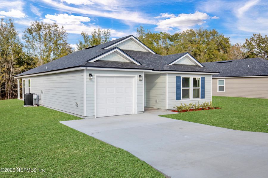 Front exterior of a new home in , Palatka, FL, highlighting curb appeal (Image 21).