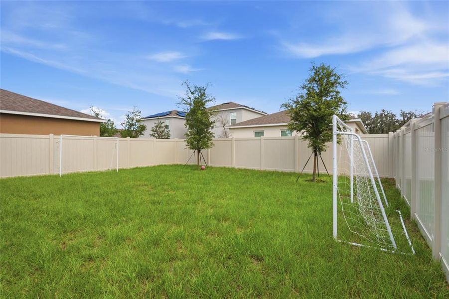 Exterior details and patio area of a home in Cascades, Davenport (Image 4).