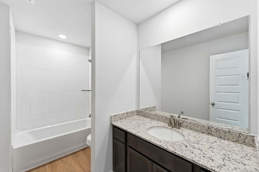 Furnished interior view inside a new home in Hickory Ridge, Elmendorf (Image 5).