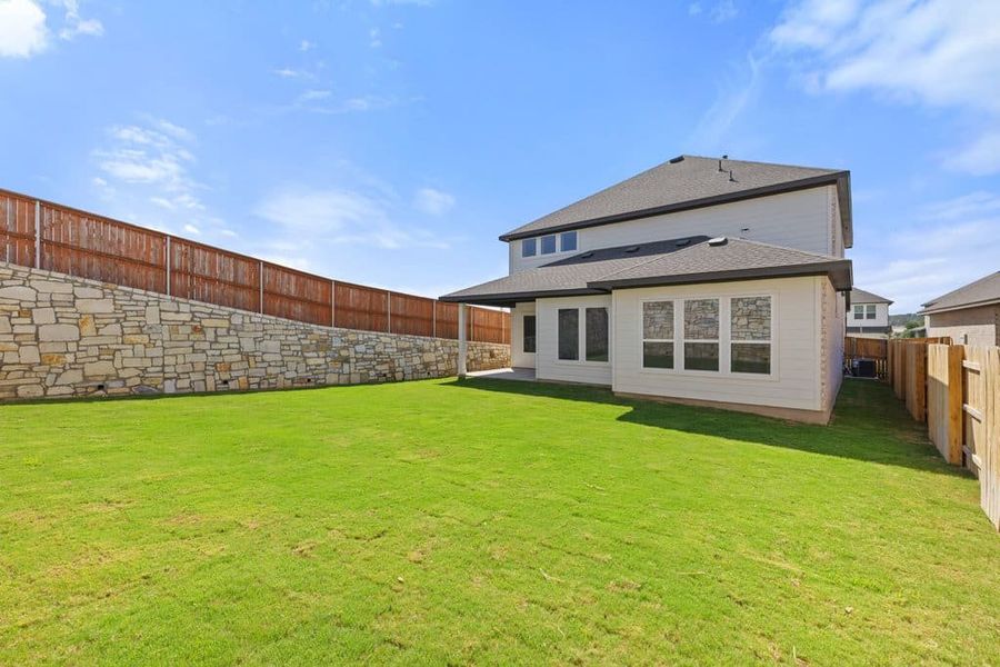 Exterior details and patio area of a home in Lariat, Liberty Hill (Image 25). Exterior details and patio area of a home in Lariat, Liberty Hill (Image 25).