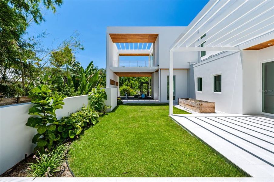Exterior details and patio area of a home in , Sarasota (Image 41).