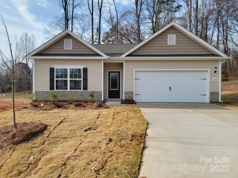 Front exterior of a new home in , Winston-Salem, NC, highlighting curb appeal (Image 1).