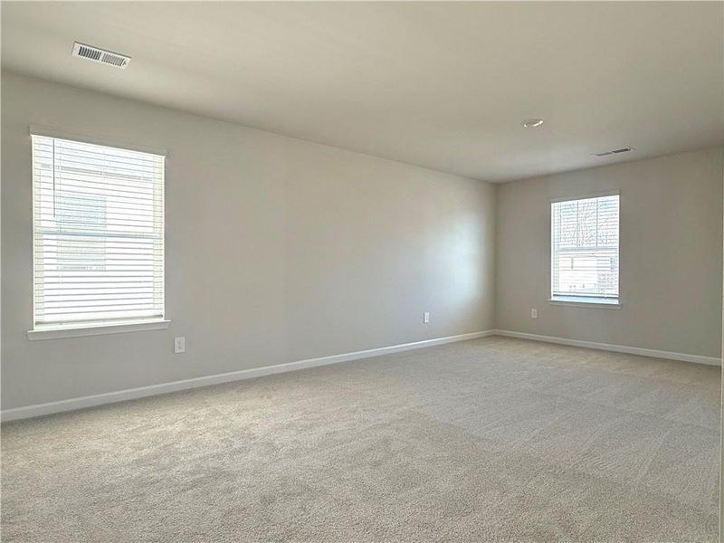Spacious, unfurnished interior of a new home in Vines at Mill Creek - Estate Series, Braselton (Image 25).