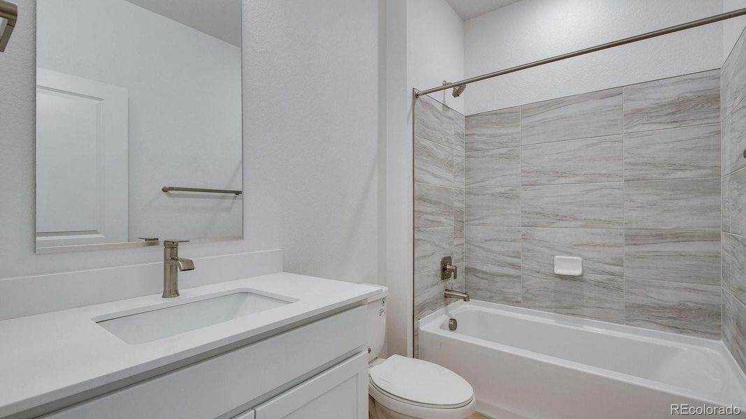 Furnished interior view inside a new home in Trails at Crowfoot, Parker (Image 8).