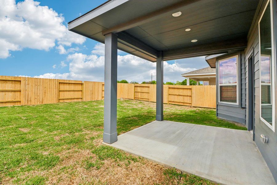 Exterior details and patio area of a home in Sanford Farms - Premier Series, Waller (Image 3).
