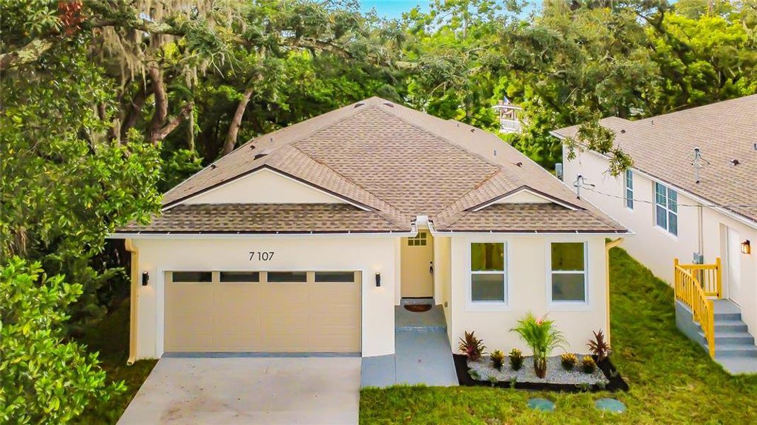 Front exterior of a new home in , Orlando, FL, highlighting curb appeal (Image 28).