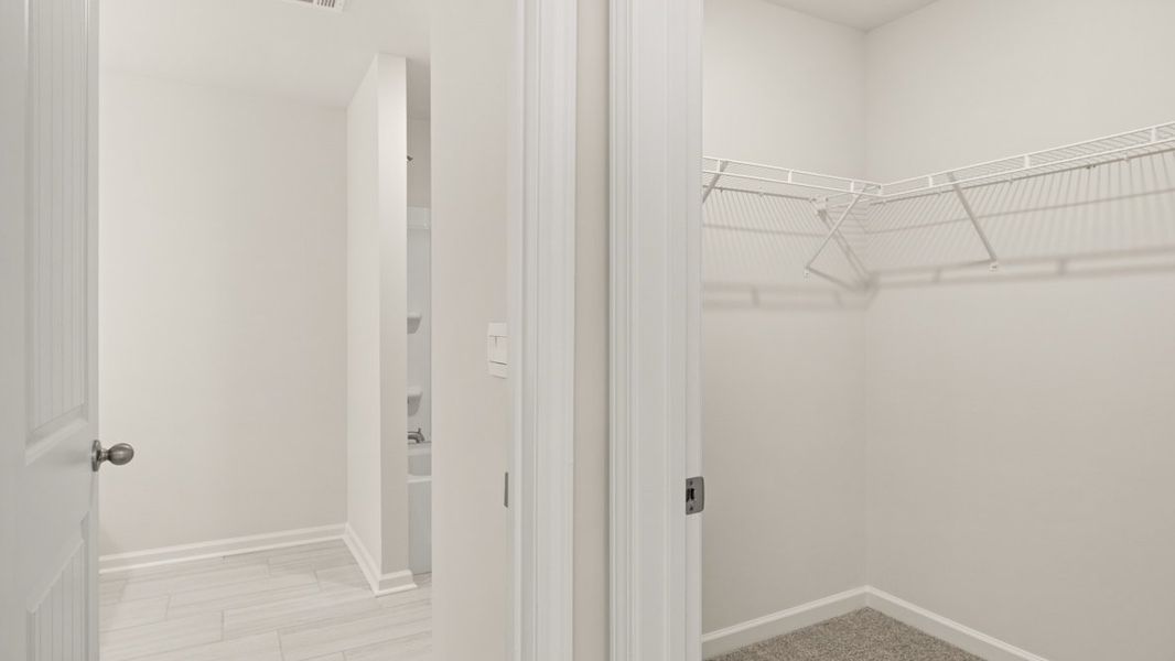 Representative unfurnished interior of a home built from the WINDSOR by D.R. Horton in Butner Estates, South Fulton (Image 62).