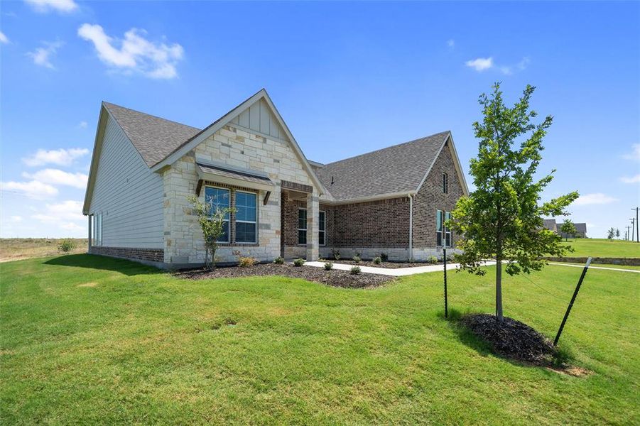 Front exterior of a new home in Parker Heights, Valley View, TX, highlighting curb appeal (Image 26). Front exterior of a new home in Parker Heights, Valley View, TX, highlighting curb appeal (Image 26).