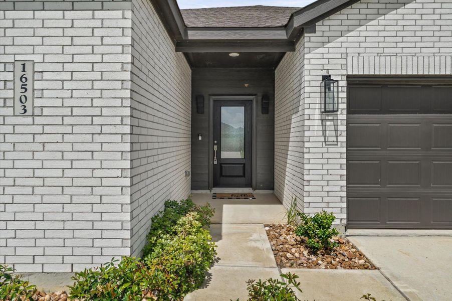 Exterior details and patio area of a home in The Grand Prairie, Hockley (Image 24).