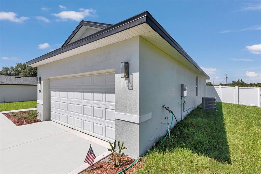 Front exterior of a new home in , Citrus Springs, FL, highlighting curb appeal (Image 19).