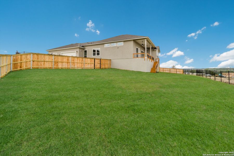Exterior details and patio area of a home in Johnson Ranch, Bulverde (Image 3).