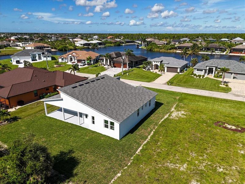 Front exterior of a new home in , Port Charlotte, FL, highlighting curb appeal (Image 19).