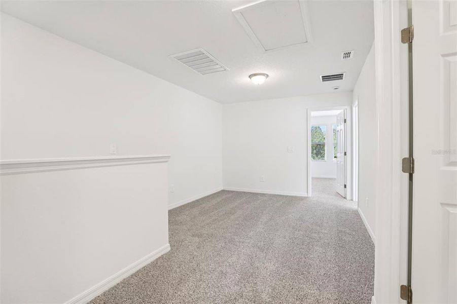 Spacious, unfurnished interior of a new home in The Meadow at Crossprairie Townes, St. Cloud (Image 21).