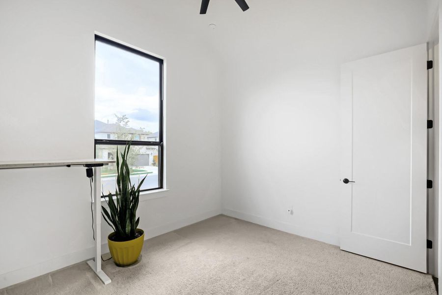 Spacious, unfurnished interior of a new home in 6 Creeks at Waterridge, Kyle (Image 31).