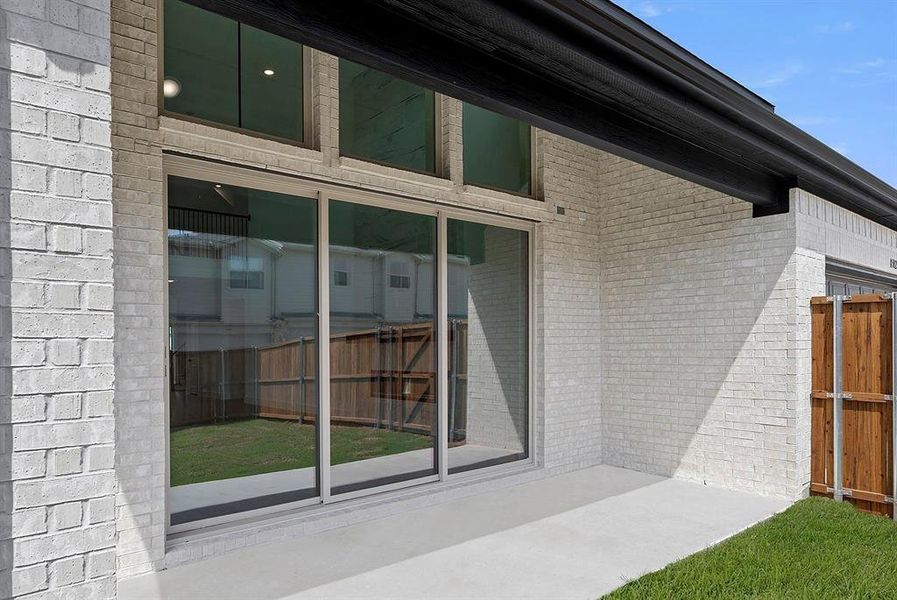 Exterior details and patio area of a home in Trails at Cottonwood Creek, Rowlett (Image 4).
