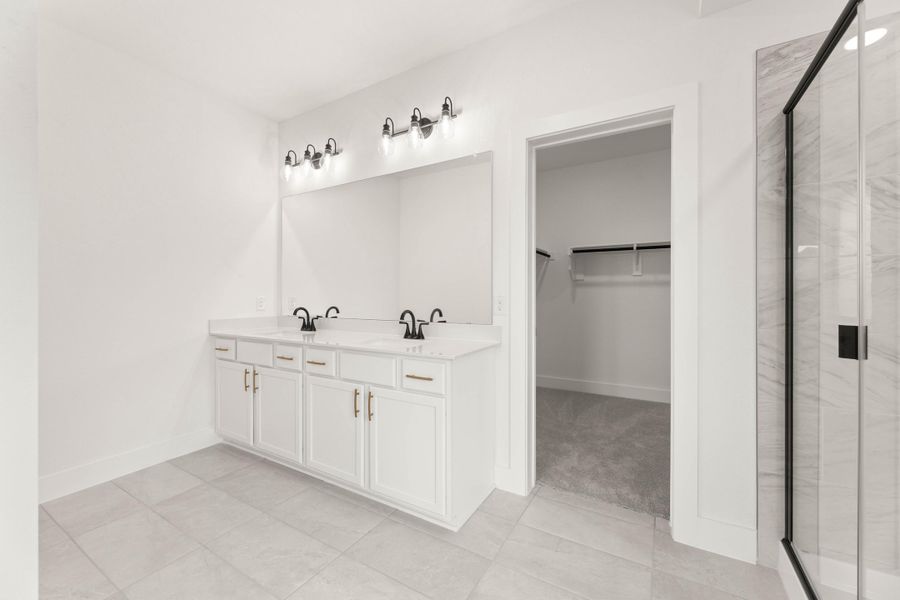 Representative furnished interior of a home built from the Laurel by Tri Pointe Homes in Treeline, Justin (Image 11).