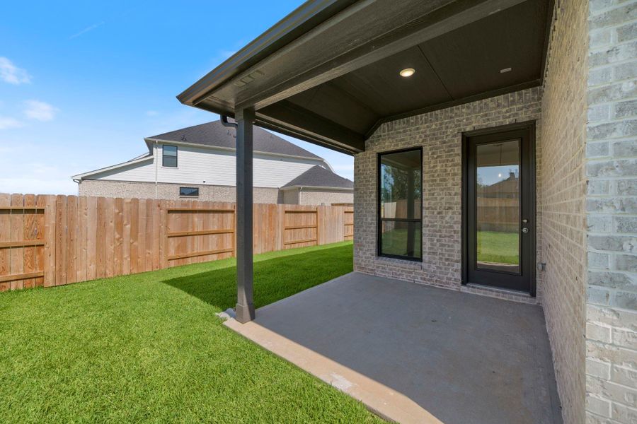 Front exterior of a new home in Katy Court, Katy, TX, highlighting curb appeal (Image 14). Front exterior of a new home in Katy Court, Katy, TX, highlighting curb appeal (Image 14).