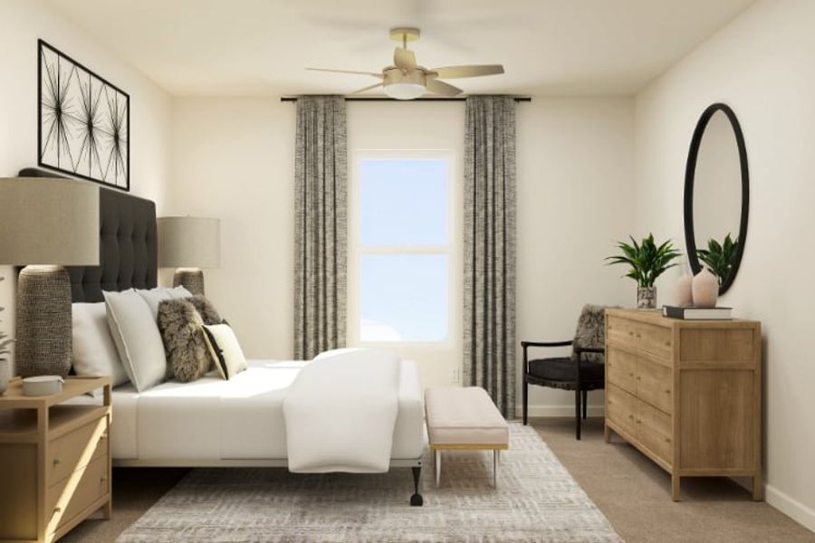 A room with a white couch and a white chair.