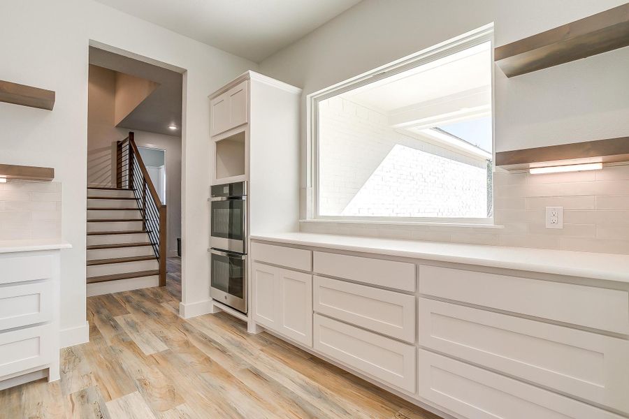 Representative furnished interior of a home built from the Pecan Grove by Trinity Classic Homes in The Reserve at Shadle, Poolville (Image 6). Representative furnished interior of a home built from the Pecan Grove by Trinity Classic Homes in The Reserve at Shadle, Poolville (Image 6).