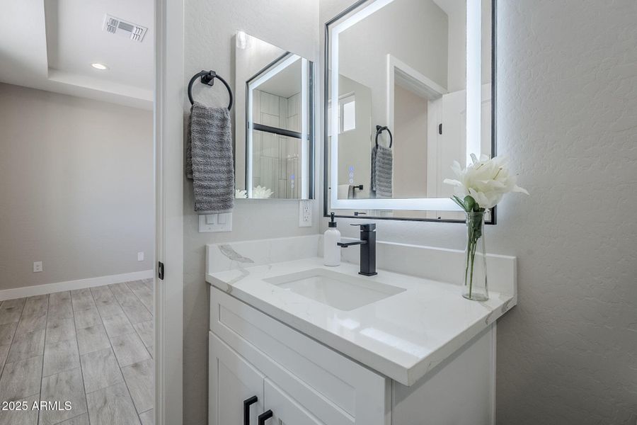 Primary Bathroom with light up mirror
