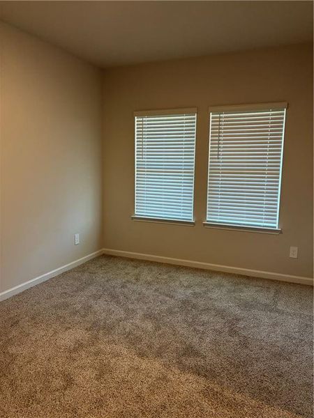 Spacious, unfurnished interior of a new home in Hamilton Crossing, Buford (Image 9).