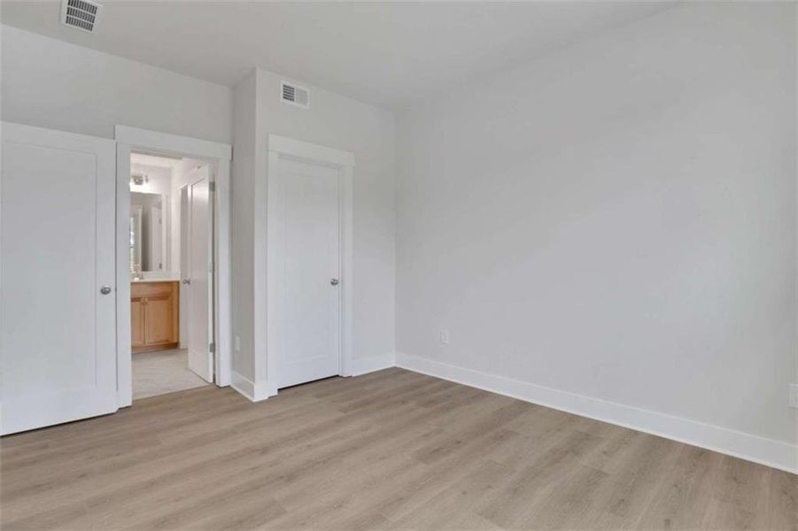 Spacious, unfurnished interior of a new home in The Paddocks at Doc Hughes, Buford (Image 36).