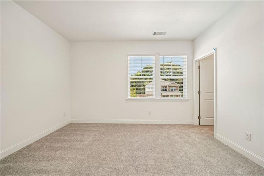 Spacious, unfurnished interior of a new home in Bennett Farm, Loganville (Image 29).