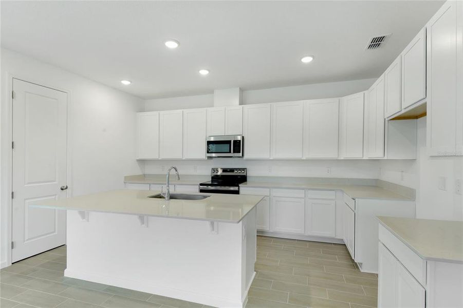 Furnished interior view inside a new home in Seasons at Grandview Gardens, Deland (Image 8).