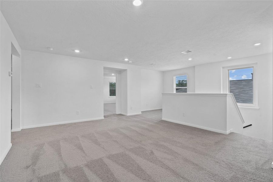 Enjoy the Game Room—an additional living area perfect for a game room, media space, or a peaceful retreat.