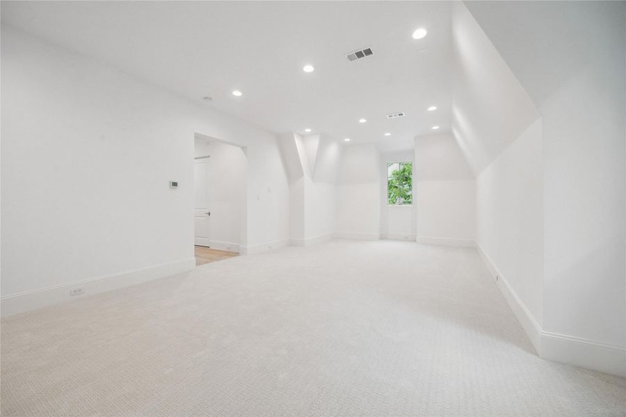 Oversized third floor flex space. Perfect for a gameroom, lounge, office, or more! **Photo is of another home in the community and for information purposes only. Buyer to verify all details.** Oversized third floor flex space. Perfect for a gameroom, lounge, office, or more! **Photo is of another home in the community and for information purposes only. Buyer to verify all details.**