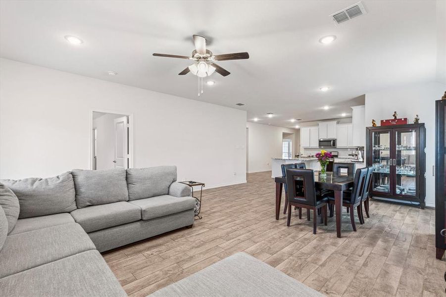 View from the living room into the kitchen/front of the home.