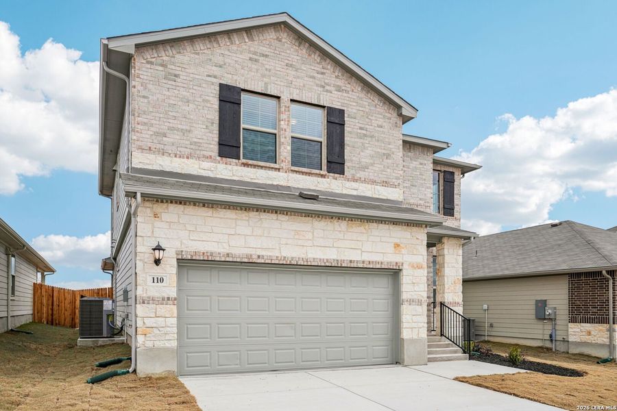 Front exterior of a new home in Legendary Trails - Premier Series, Cibolo, TX, highlighting curb appeal (Image 22).