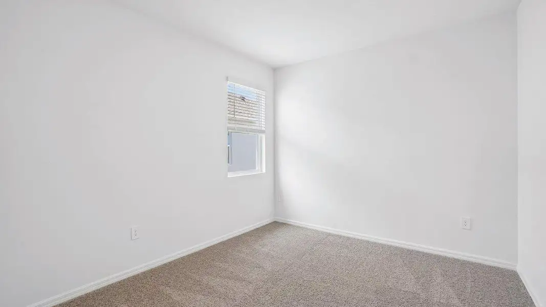 Spacious, unfurnished interior of a new home in Harmony at Lake Eloise, Winter Haven (Image 23).