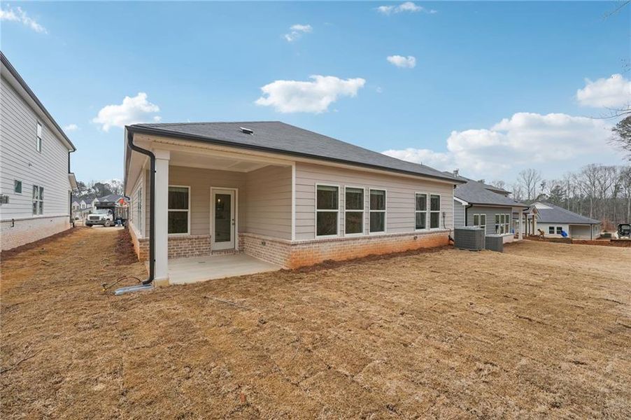 Exterior details and patio area of a home in Westmont Preserve, Powder Springs (Image 29).