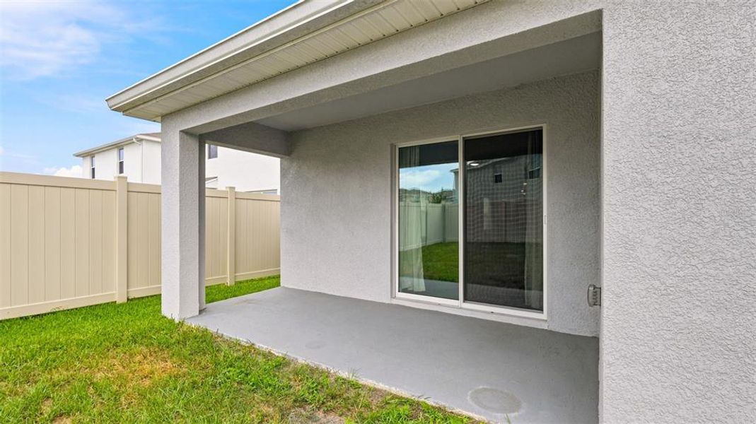 Exterior details and patio area of a home in Northwater at Two Rivers, Zephyrhills (Image 3).