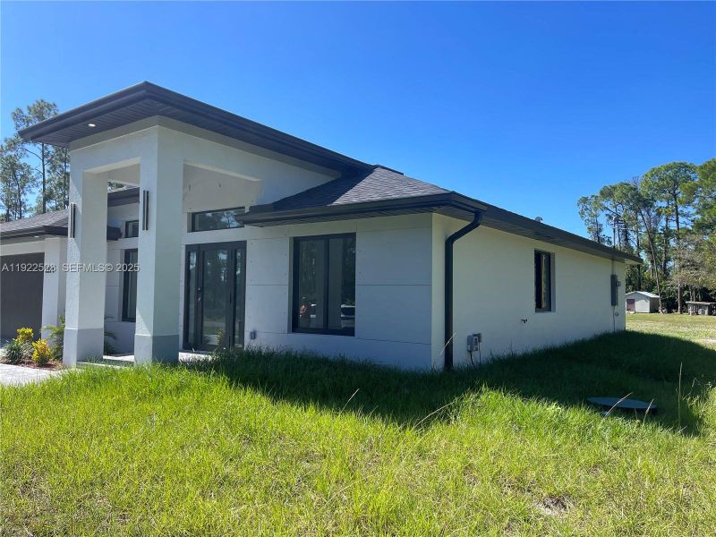 Exterior details and patio area of a home in , Lehigh Acres (Image 26). Exterior details and patio area of a home in , Lehigh Acres (Image 26).