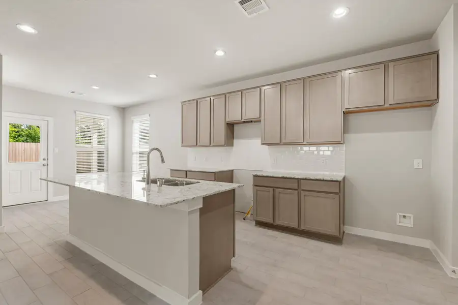 Furnished interior view inside a new home in Grand Oaks – The Cove, Houston (Image 4). Furnished interior view inside a new home in Grand Oaks – The Cove, Houston (Image 4).