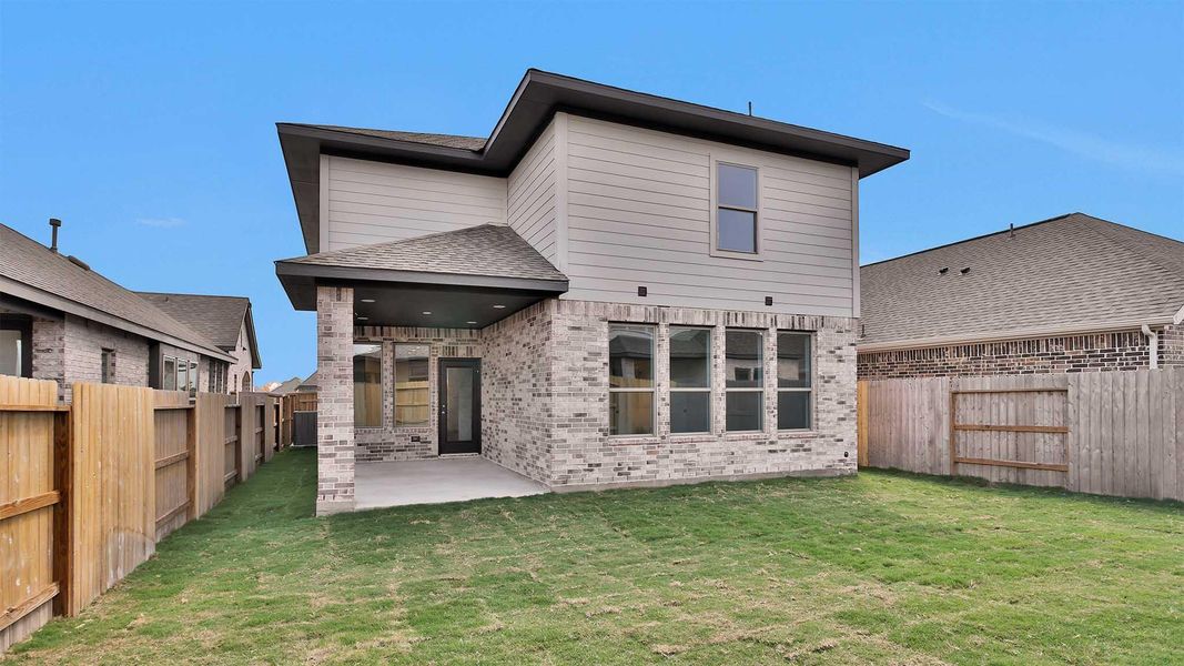 Exterior details and patio area of a home in Brookewater 40', Rosenberg (Image 2). Exterior details and patio area of a home in Brookewater 40', Rosenberg (Image 2).