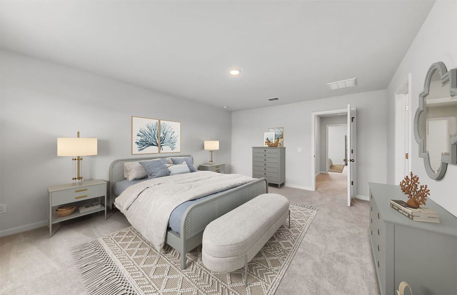 Unwind in the spacious Owner's Suite with soft lighting and a desirable walk-in closet.