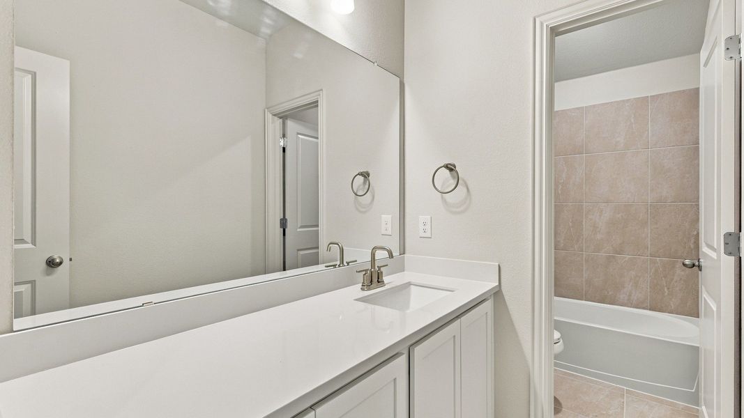Furnished interior view inside a new home in Westridge Journey, McKinney (Image 11).
