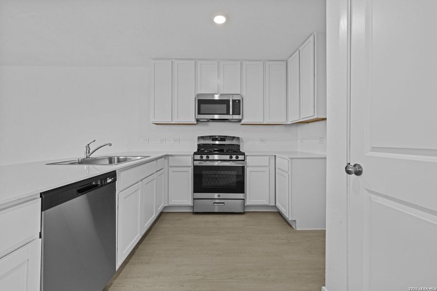 Furnished interior view inside a new home in Spring Grove, St. Hedwig (Image 9).