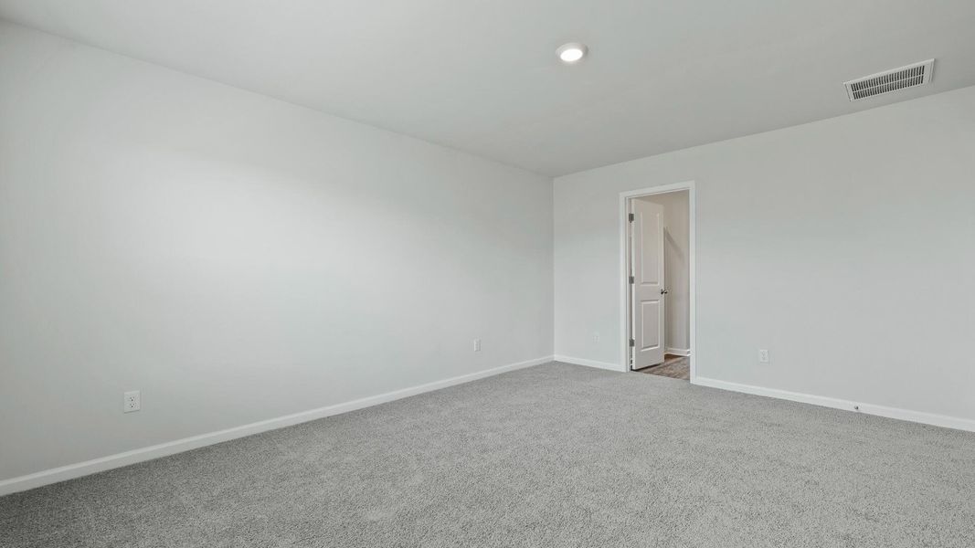 Spacious, unfurnished interior of a new home in Pine Hills at Cane Bay, Summerville (Image 18).