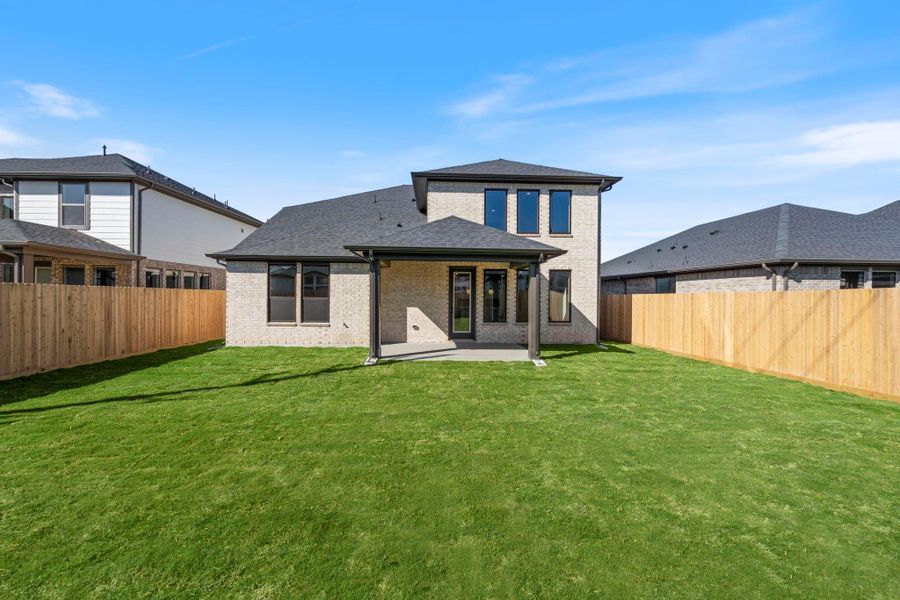 Exterior details and patio area of a home in Harvest Green - Final Opportunities, Richmond (Image 2).