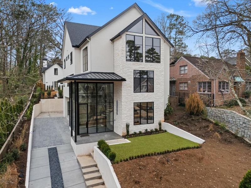 Front exterior of a new home in , Atlanta, GA, highlighting curb appeal (Image 24). Front exterior of a new home in , Atlanta, GA, highlighting curb appeal (Image 24).